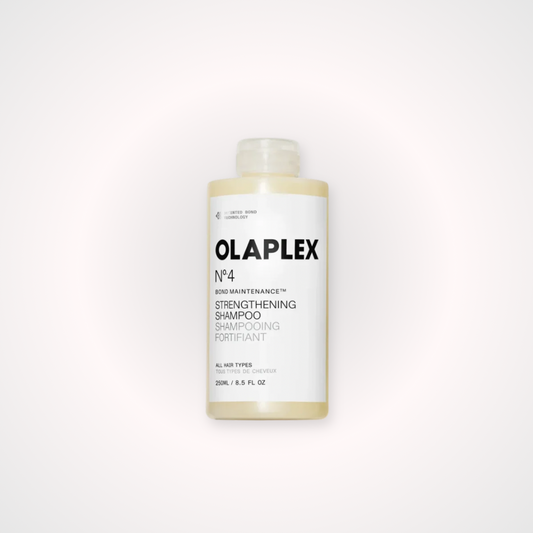 OLAPLEX Nº4 BOND MAINTENANCE SHAMPOO, shampoo reparador que limpia, fortalece y ayuda a mantener el cabello dañado, teñido o tratado químicamente. para el cuidado, reparación y fortalecimiento del cabello dañado, quebradizo y tratado químicamente, diseñados para mejorar la salud, suavidad, brillo y resistencia de la fibra capilar.