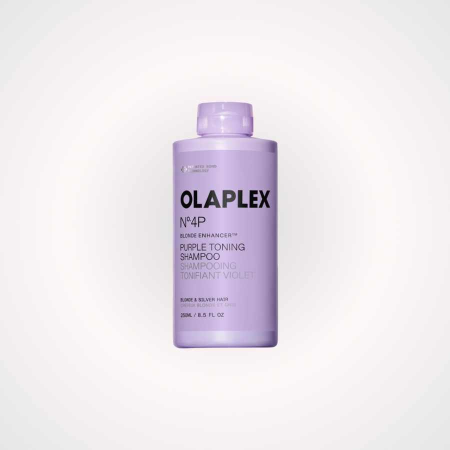 OLAPLEX Nº4P BLONDE ENHANCER™ TONING SHAMPOO, shampoo violeta matizador para cabello rubio, decolorado o con canas que ayuda a neutralizar tonos amarillos. Productos Olaplex para el cuidado, reparación y fortalecimiento del cabello dañado, quebradizo y tratado químicamente, diseñados para mejorar la salud, suavidad, brillo y resistencia de la fibra capilar.